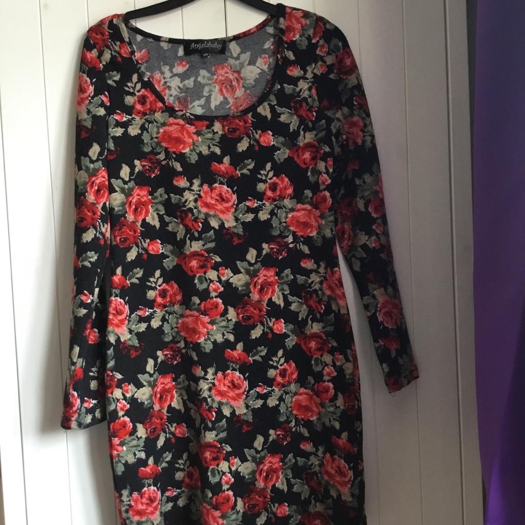 Nice little long sleeved dress/top. Would look lovely with black leggings. WV13 1HA area
