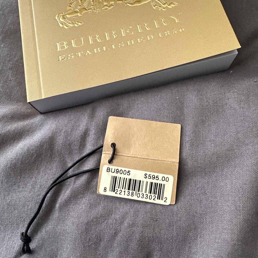 Brand new unwanted gift Burberry rose gold watch, still got original tags, and clear cover on wrist band, battery is fully working, comes with box and manual booklet. These watches are being sold for around £179.( please see advert attached for reference only)