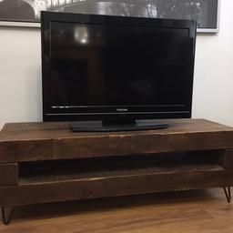 Large solid wood TV stand made from reclaimed railway sleepers with hairpin legs. Really heavy piece of furniture. Measuring 120cm long x 39cm deep x 40cm tall. Viewing/collection is Leeds LS24 & delivery is available if required - £125