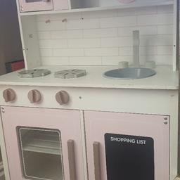 This wooden toy kitchen features a
sink&taps, microwave, oven, hobs,
mounted clock and a chalk board. I am including all the utensils/ kitchen accessories in the price.

Selling for only 19.99 for kitchen and accessories/utensils