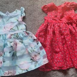 Beautiful girls.Summer dresses both size 12-18 months In excellent condition have only been won a few times In excellent condition they are around the length unsleeveless.