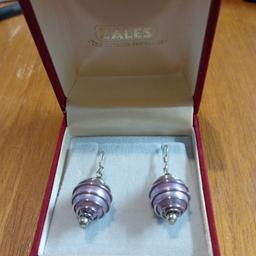 absolutely beautiful vintage silver 9w5 earrings I think its a pearl inside the swirls really unusual look great anytime can post or combine postage