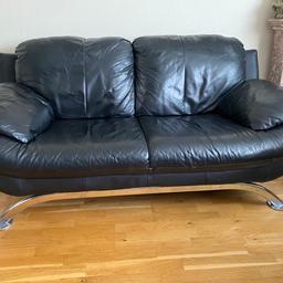 Black leather sofa that can sit 2/3 people. Measures approx. 5.5-5.75 ft x 2 ft. The arms can double up as pillows transforming the sofa into a bed for those lazy Sunday snoozes. The feet are a solid steel base giving it a robust feel. Priced for quick sale ONO. BUYER TO COLLECT.