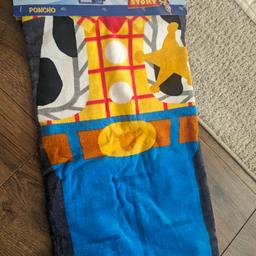 BRAND NEW
Woody Toy story Poncho
beach/swimming towel