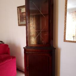 Mahogany corner display cabinet all solid wood with leaded glass display door and lower solid wood door both with quality locks and keys, there is also a display light , made by Thames in excellent condition, buyer collects, thanks Anthony.
