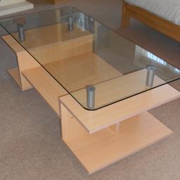 Great table with toughened glass top.
4 wheels on its base (2 of which lock) for easy manouevering.

Size 120x60x45cm / 48 x 24 x 18 inches.

Table is in very good condition, with only a couple of minor corner chips to woodwork (see photo). Currently disassmbled for easy transport. Location Flitwick.

ONLY £29 and at least half will go to my chosen charity Water Aid!