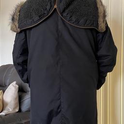 Men’s size Medium River Island - Black Parka Coat with fur trim hood, zip and press studded front fastening. With numerous pockets, inner mobile pocket,fur lined, lovely warm coat
In fair/good condition just some slight fraying inside the front pockets as seen on photo number 5. 
From Smoke & Pet free home
Door collection only, Cash on collection only please.