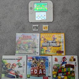 Nintendo 2DS with 7 Games, all working perfectly, complete with Box except the 2 Games that don't have cases