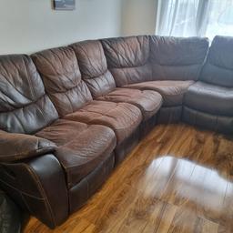 Recliner Corner Sofa with 2 Reclining Seats and 3 Normal Seats. One of the Reclining Seats' Locks are Slightly Damaged. But can be separated. Some signs of wear all over the sofa.