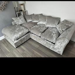 silver crushed velvet corner sofa, approx 3 years old. None smoking and pet free home. Ready for collection now. There is slight damage underneath to one of the cushions but its not visible.