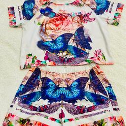 Cherry koko butterfly floral top & shorts set 
As shown see measurements in photos. 
MED - UK 8-12 
Price for both 
COLLECTION SHILDON OR CAN POST FOR £3 BT!