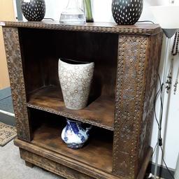 This absolutely beautiful open shelf unit is hand carved from one block of wood and is solid and very heavy!... Not too sure what wood it is but looks like African Mango or Sheesham wood. The carving on it is something else and will last forever! It is in excellent like new, condition.

42 inches wide x almost 18 inches deep x 51.5 inches high.

Our second hand furniture mill shop is LOW COST MOVES, at St Paul's trading estate, Copley Mill, off Huddersfield Road, Stalybridge SK15 3DN... Delivery available for an extra charge.

There are some large metal gates next to St Paul's church... Go through them, bear immediate left and we are at the bottom of the slope, up from the red steps... 

If you are interested in this or any other item, please contact me on 07734 330574, or on the shop 0161 879 9365...Many thanks, Helen.

We are OPEN Monday to Friday from 10 am - 5 pm and Saturday 10 am - 3.30 pm. CLOSED Sundays.