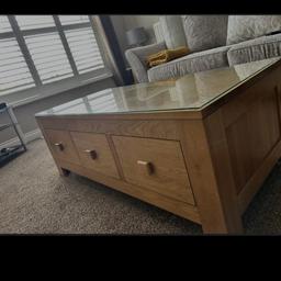 This solid oak coffee table from Oak Furniture Land is a perfect addition to any living room. Crafted from high-quality oak, this table is built to last and provide a sturdy surface for your coffee, books or snacks. The table features a solid pattern, adding a touch of elegance to your space and has a made to measure glass on top which not only protects but gives a special finish to your room. Ideal for any home, this coffee table is versatile and can be used for various purposes. Its timeless design ensures it will never go out of fashion. Has been regularly polished with the Oak Furniture Land polish.
Collection from Coalville, Leicestershire