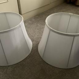 2 White Lampshades. Diameter-Top 22cm,Bottom 30cm,20cm High. 
Collection Preferred from B74-Streetly