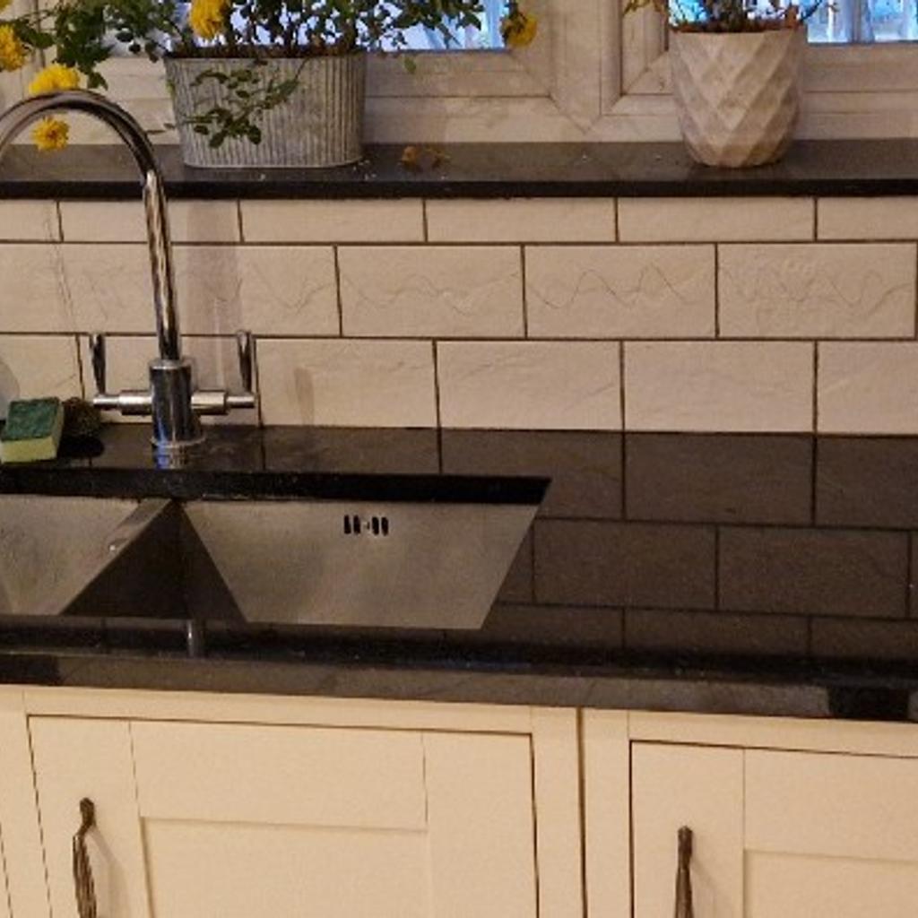 granite black with gold sparle worktop.
Good condition.
space for double sink

length 3metres
depth 62.5cm

sink space 82cm by 39cm

1 smaller piece of granite work window sill
length 185cm
depth 22.5cm