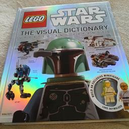 As new, Lego Star Wars Visual Dictionary, comes with the luke skywalker action figure, unwanted unused gift.
