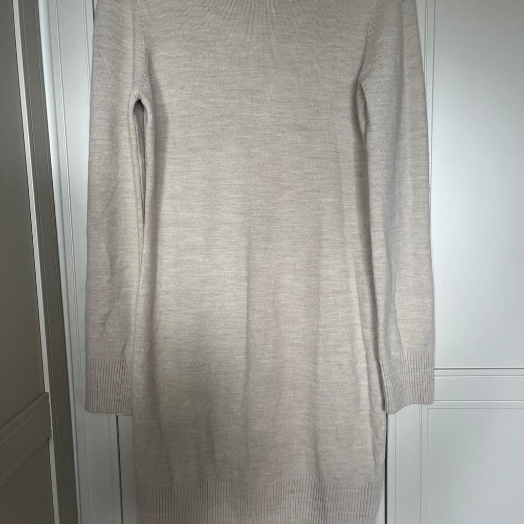 Warm polo neck long jumper, only worn once great condition.