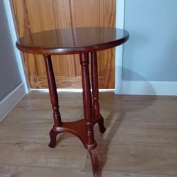 Round side coffee Table on a mahogany effect finish 
Length 16 inches 
Width 16 inches 
Height 22 inches 
In very good clean condition 

Postcode for collection is bd2 4bs  - Just off Queens Road Bradford 2 area

Delivery requests will incur a extra charge of minimum £10 plus