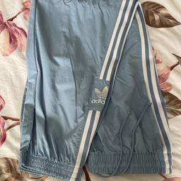 Worn once. Adults Lightweight pale blue tracksuit bottoms by Adidas. Cuff bottoms Size 18.