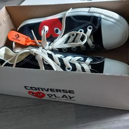 For Sale: Brand new Comme des Garçons PLAY shoes in original packaging with tags. Received as a gift from Turkey, but sadly they don't fit my wide feet. Grab this stylish pair at a great price!