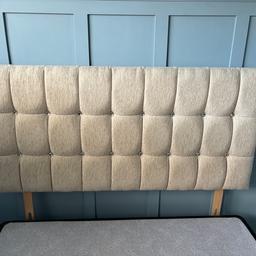 Double headboard in cream with diamanté studs. Width 138cm. Height 67cm. Good condition. Collection from Normanby. Ts6