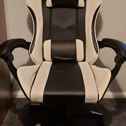 Fully Adjustable gaming chair on wheels 
Black and white
