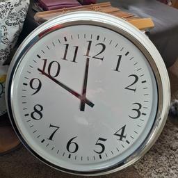 Large sized Clock. Cream coloured rim with silver edging. Black hands and numbers. 
19 inches across.  Perfect working order. Like new! £20
Collection from Halesowen B63