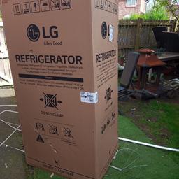 brand new LG double door refrigerator received for a birthday present but received 2 only need 1