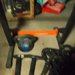 84kg cast iron weights, barbell, squat rack, battle rope , dip bars and 8 kg kettle bell