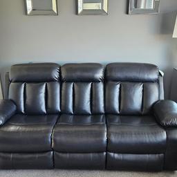 cinema three and two seater black suite reclines both ends with cup holders in the middle of 3 seater excellent condition as only used as spare in other living room. collection only dovecot, Liverpool .open to offers