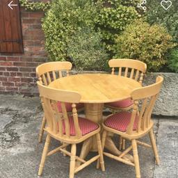 Solid wood, hand built table. Comes with 4 chairs and is in great condition with a few small marks.

There are cushions on the chairs as that is what we used so will include those in sale if wanted.

The table is 92cm in diameter and with the chairs tucked under is about 116cm.