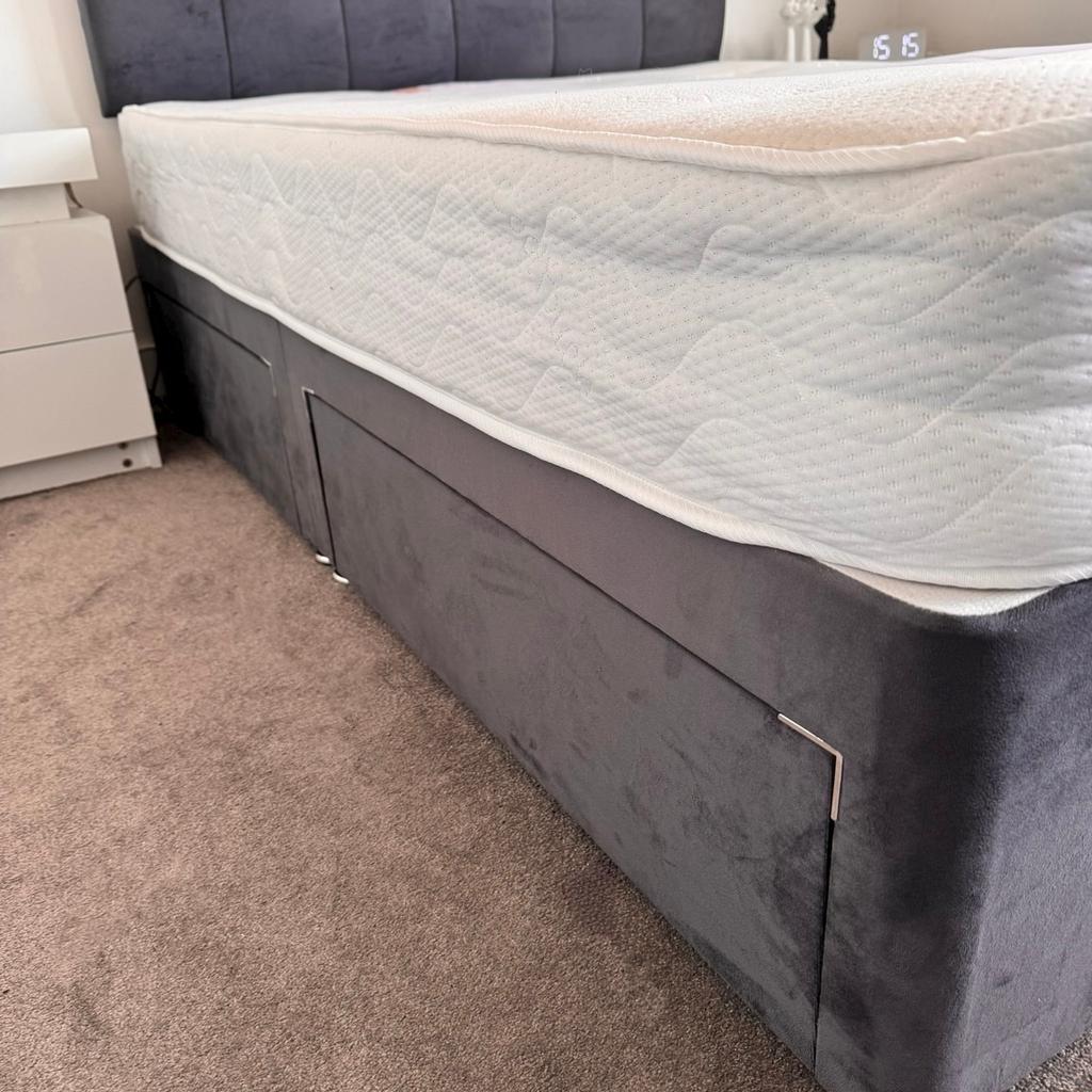 Bed Centre 4ft6 Double (135cm X 190cm) Divan Bed with 32’’ strut grey headboard and two drawers on the same side. Comes with plush memory foam mattress for extreme comfort. Price negotiable.