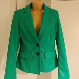 Woman’s lovely new soft leather style blazer short length 
New condition with tags 
Form a pet and smoke free home 
Thanks for looking
Collection se16 4en or Royal Mail postage