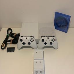 Xbox One S 1TB comes complete in excellent condition a well looked after console runs perfectly with no issues comes with 2 original controllers please note one of the controllers the down button on the D pad needs to be pressed firmly to work for most games this button isn’t needed 

Simply plug in and play

What u get -
Xbox one S console
Power cable
Hdmi
X2 Original wireless controller
Dual charger
X2 rechargeable batteries 
X1 extra battery cover 
One game (see pic)

£100

Collection or local delivery available

Thank you

*From A Smoke & Pet Free Home*