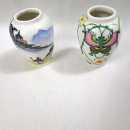 2 LOVELY VINTAGE HANDPAINTED MINI CHINESE VASES 1 DEPICTING A TRAVELLER & THE SECOND DEPICTING BUTTERFLIES & FLOWERS APPROX 2 1/2" HIGH VERY GOOD CONDITION.