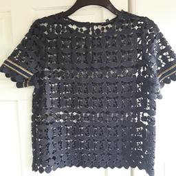 Next Petite size 14 lace blouse with gold trim
Might fit a size12 lady
Hardly worn