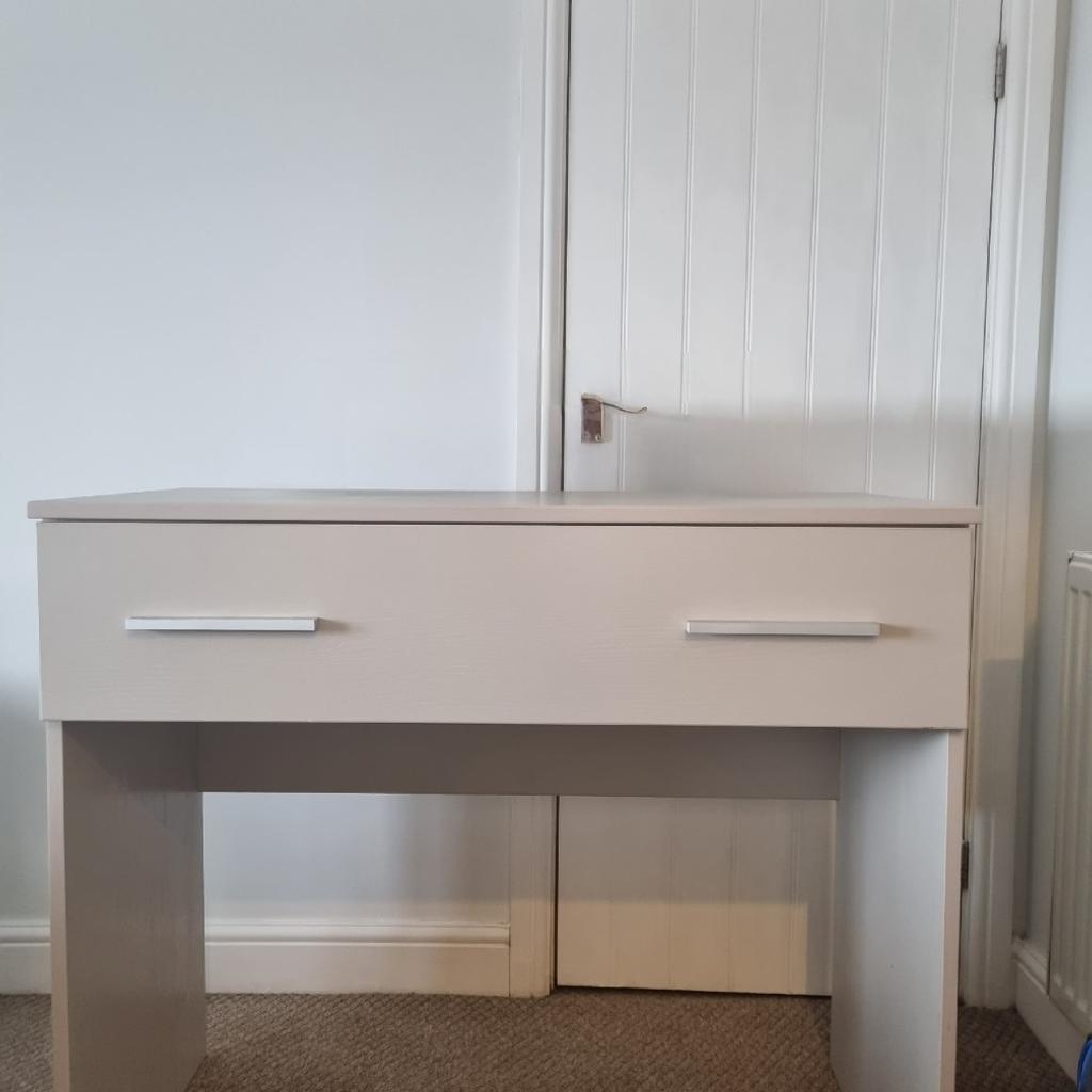 light grey with silver finishes
Solid desk/dressing table w

mini shelf. - not connected to the desk

1 long drawer with soft close features.
height 34.5 in
width 40 in
depth 19in

bespoke desk from IDS
for collection only
