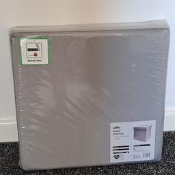 BRAND NEW. Excellent condition.  
Has never been used before. 
Size: 40 x 40 x 40cm (cube) 
Beautiful velour Ottoman in grey colour. 
Perfect for any room. 
Collection only 
Can be posted anywhere in the UK if postage costs are covered.
