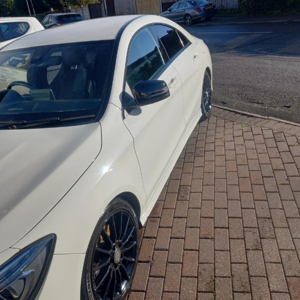 White Mercedes benz- In Great condition -MOT Oct 24- JUST HAD IT SERVICED THIS MONTH- 2 KEYS - CARD. Vehicle ROAD TAX is 35.00 per year. Next tax due NOV 2024.Feel free to few in person.