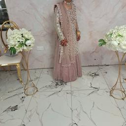 A beautiful rose gold pink lengha, knee length kameez, net material, fully lined with net scarf, worn for 3 hours only, silver diamond work and white pearl embroidery on kameez and lengha, bought for £350 now on for £65 , two different sizes available to chose from 34 to fit uk size 6/8 and 38 to fit uk size 8/10 or 12, elegant and glamorous, worth the price, we currently are selling two lenghas the same design for £65 each, please ask any questions, Offers will be looked into, Jewellery available to buy separately please ask if needed.