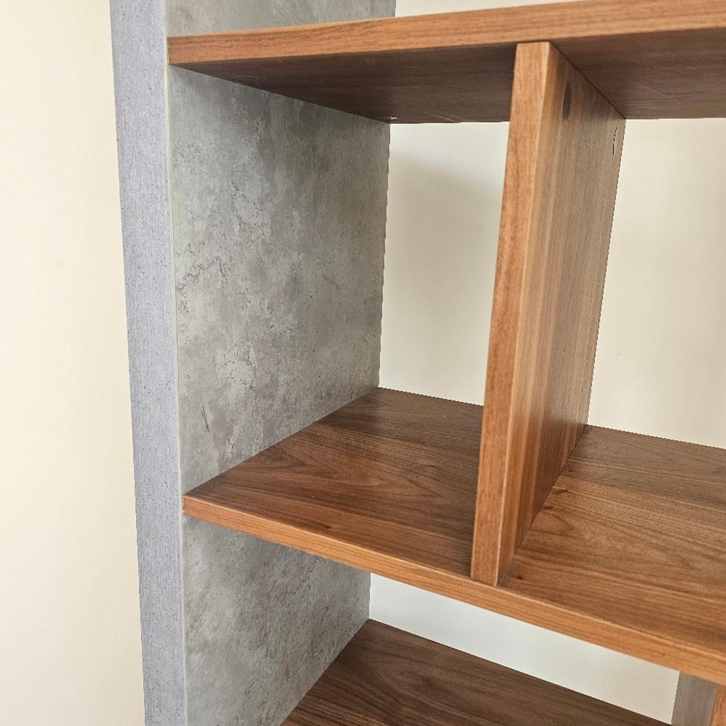 Grey stone and wood display unit.
Very good quality.
Shelves with bottom drawer.
Scrathes on drawer as shown in image.
L 74inch X 31.5inch
Open for offers to come as a set with TV Stand and/or Dining table