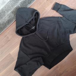 ladies black cropped hooded top from miss selfidge.Good clean condition no fading or bobbling.Size 8 £15 collect only.
