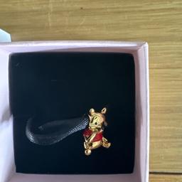 Unwanted gold Winnie the Pooh Pandora charm in original box.