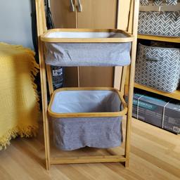 solid wood frame with 2 storage baskets which fold flat when you fold it up
measurements are in the pictures.it is to big for me.never used
pick up only please