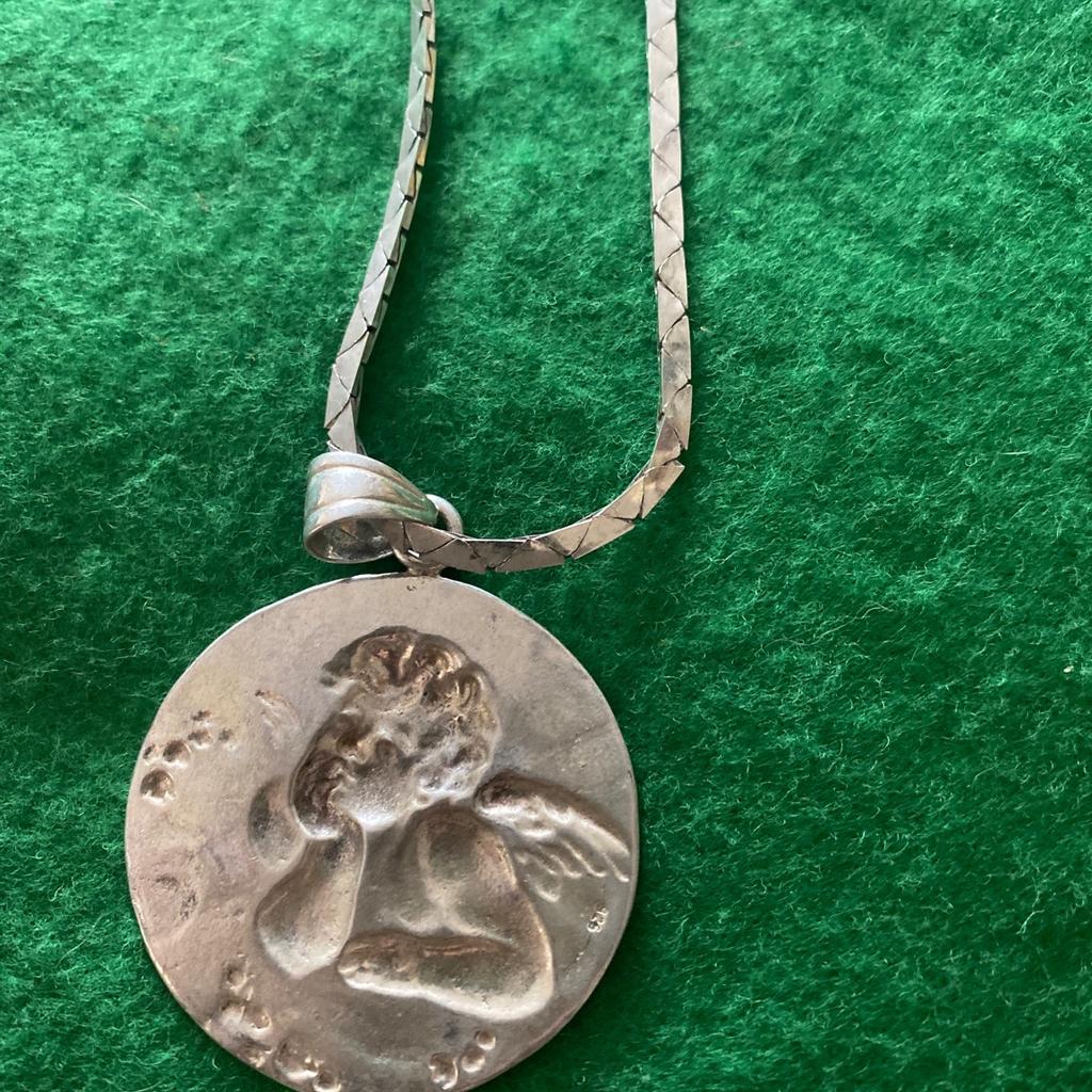 Lovely silver chain and pendant huge piece. 28.8 grams in weight. Fully hallmarked fantastic piece.