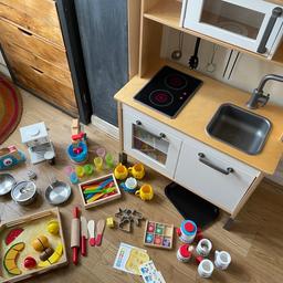 IKEA DUKTIG Kids Kitchen

This has been well used, but still in decent condition, with the usual signs of wear and tear. The lights on the hob don’t work. I don’t know if this is due to loose connections or if it needs new batteries.

We have a number of kitchen items as shown in photos. These have all been used a lot and show clear signs of use. You are welcome to take these, or just the kitchen if preferred. Includes Melissa and Doug mixer and toaster and happy meal Mr Men cups.