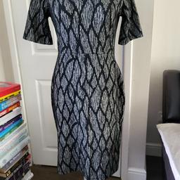Black patterned dress from F&F in size 10. Hardly used
