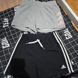 girls 13-14 shorts all adidas brand grey shorts never worn was washed but daugter never put them on, the black pair are used no more than 4 wears out of them so still in really good condition.