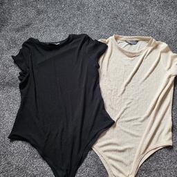 2 bodysuits. never worn. Black and stone both xl. £5 both. collect only unless local to burnley.