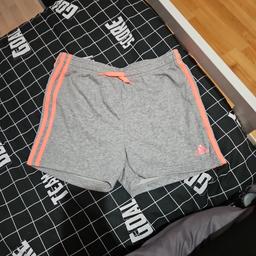 girls grey adidas shorts age 14-15 new without tags was washed when first bought but daughter never worn them